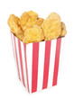 Fried chicken nuggets in red white striped box