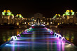 Photo: Dancing Multi Colored fountain at dark night Dancing Multi Colored fountain at dark night