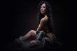 Gorgeous sexy brunette with fur coat indoors