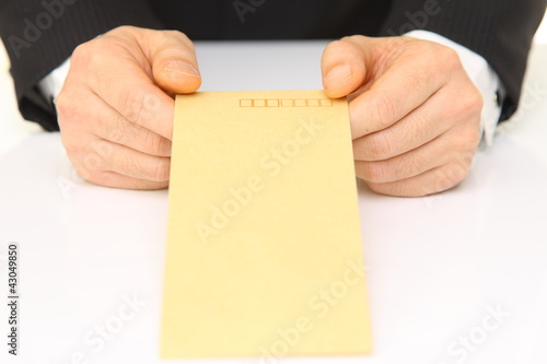 Photo: businessman submits documents businessman submits documents