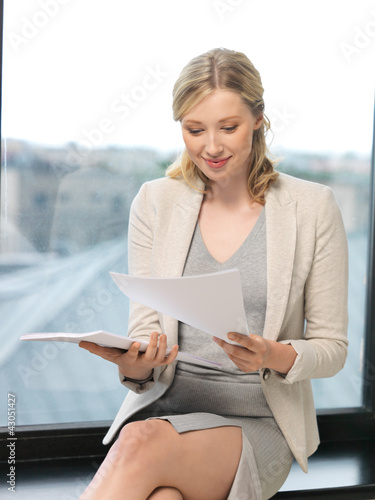 Photo: happy woman with documents happy woman with documents