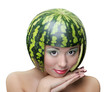 Funny woman with water-melon as helmet