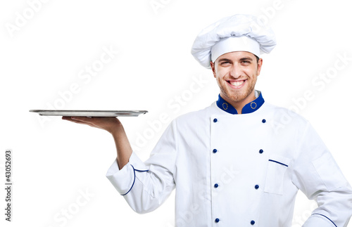 Photo: Chef holding a tray Chef holding a tray