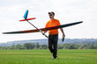 Foto: Man holds the RC glider Man holds the RC glider