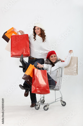 Photo: girlfriends shopping at the mall girlfriends shopping at the mall
