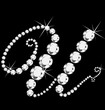 U italic letter with diamonds