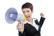 Young business lady screaming to loudspeaker
