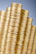 Golden coins in high stacks