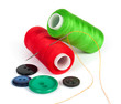Bobbins of thread with buttons