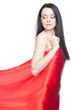 Studio portrait of sensual young woman with long dark hair