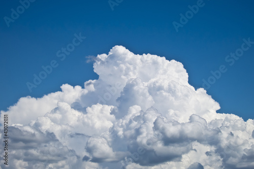 Photo: white fluffy clouds over blue sky landscape white fluffy clouds over blue sky landscape
