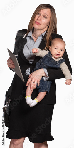 Photo: Exhausted Working Mother with Baby Exhausted Working Mother with Baby