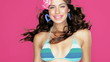Video: brunette with tropical flower in her hair wearing a blue bikini brunette with tropical flower in her hair wearing a blue bikini