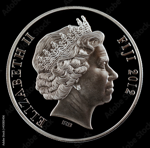 Photo: Investment coin silver 2012 Year a black background Investment coin silver 2012 Year a black background