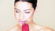 Woman with beautiful smile and ice lolly