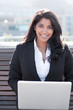 Photo: Indian businesswoman with laptop Indian businesswoman with laptop