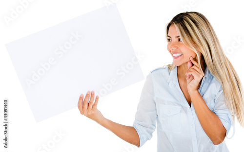 Foto: Woman holding a banner Woman holding a banner