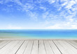 Foto: Wooden terrace looking out over a tropical cloud sky and seaview Wooden terrace looking out over a tropical cloud sky and seaview