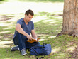 Student reading a textbook