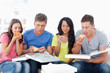 The friends tuck into the pizza just bought