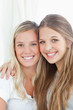 Close up of a smiling pair of sisters