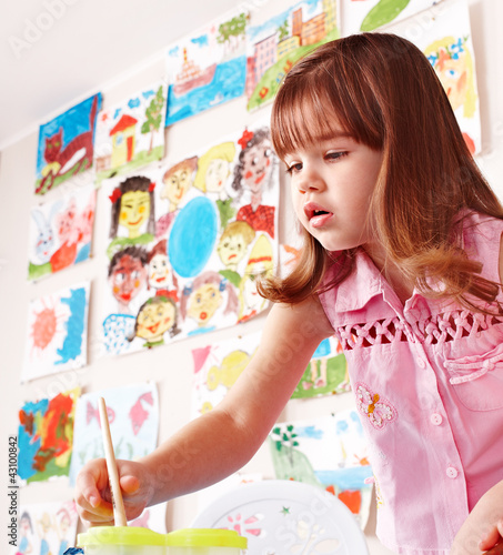 Photo: Child paint picture in preschool. Child paint picture in preschool.