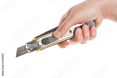 Photo: Hand with paper knife Hand with paper knife