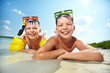Siblings on beach
