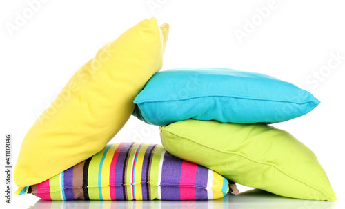 Photo: Bright color pillows isolated on white Bright color pillows isolated on white