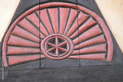Photo: Rosette an einem Fachwerkhaus Rosette an einem Fachwerkhaus