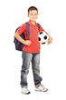 Foto: Full length portrait of a child with backpack holding a ball Full length portrait of a child with backpack holding a ball