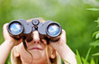 Little girl with binocular