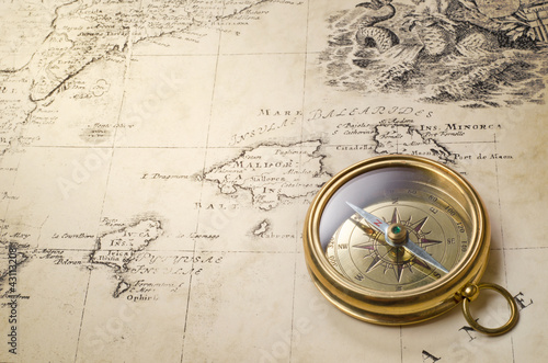 Photo: old compass and rope on vintage map 1732 old compass and rope on vintage map 1732