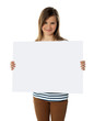 Foto: Smiling teenager showing blank white billboard Smiling teenager showing blank white billboard
