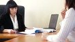Businesspeople are discussing the work in the office