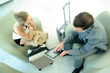 Business people in airport waiting room