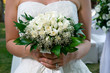 Bouquet in the hands of the bride