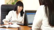Businesswoman at her Desk