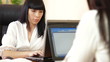Business Women Working with Laptop