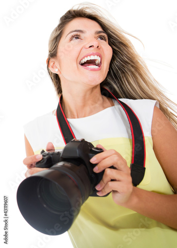 Photo: Tourist holding a camera Tourist holding a camera