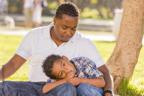 Photo: African American Father Worried About His Mixed Race Son African American Father Worried About His Mixed Race Son