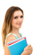 smiling woman holding notebooks