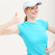Enthusiastic motivated woman giving a thumbs up