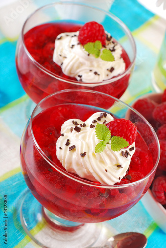 Photo: jelly dessert with raspberry and whipped cream jelly dessert with raspberry and whipped cream