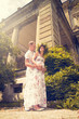 A couple in love during pregnancy in the park