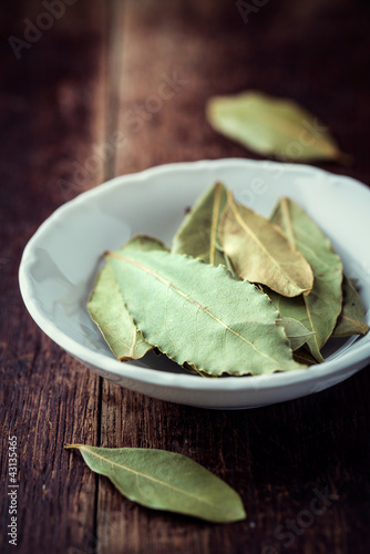 Photo: Bay leaves in a small bowl Bay leaves in a small bowl