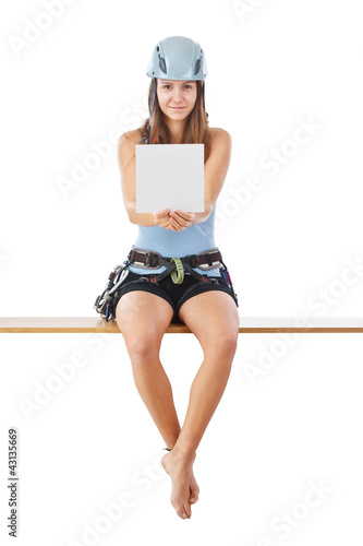 Photo: Woman in climbing equipment Woman in climbing equipment