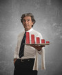 Businessman holds a tray with negative statistics