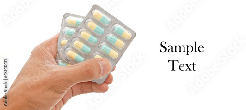 Photo: Hand Holding Antibiotic Medicine Hand Holding Antibiotic Medicine