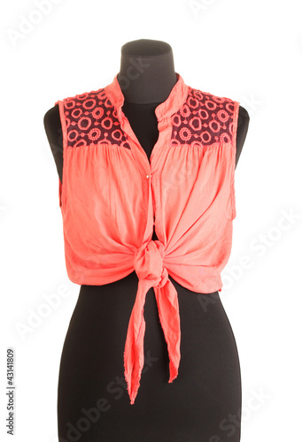 Photo: Woman red blouse on mannequin on white background Woman red blouse on mannequin on white background
